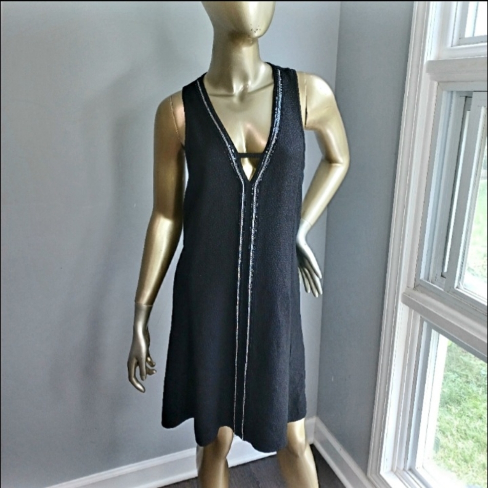 Girls on Film mini black dress with chain details